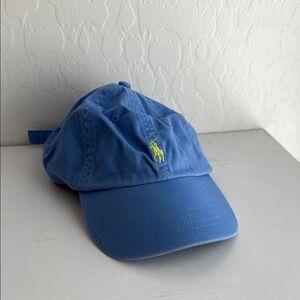 Blue Polo Cap with Green Logo